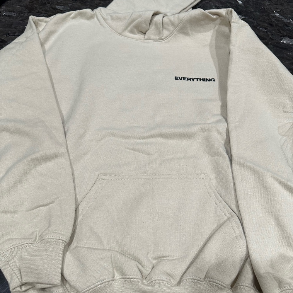Elegant Cream Hoodie with 'Everything' Detail